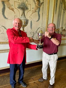 Peter Bennett receives the One Size Fitzhall Tropy from Chris Atkinson