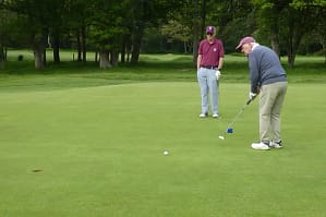 Jim Sleigh putts out
