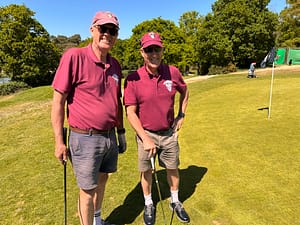 Martin Dinkele and Paul Staten on the putting green at Ipswich